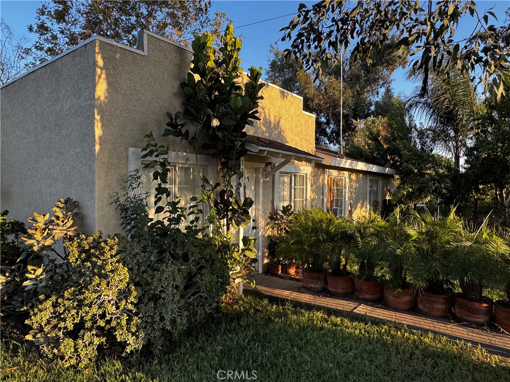 Charming Corner-Lot Home with ADU Potential in San Bernardino
Discover this inviting corner-lot residence perfectly situated in the heart of San Bernardino. Whether you’re a first-time homebuyer, looking to downsize, or a savvy investor seeking an opportunity to build an accessory dwelling unit (ADU), this home offers an ideal blend of comfort, functionality, and potential.
Step inside to a thoughtfully designed floor plan featuring a spacious living room filled with natural light, a remodeled kitchen with modern finishes, and an adjoining dining area perfect for intimate dinning. The home includes two comfortable bedrooms, one of which is an en-suite, offering privacy and convenience.
Recent upgrades enhance everyday living and energy efficiency, including central heating and air conditioning, dual-pane windows, and a covered rear porch that extends your living space outdoors.
The generously sized lot offers exciting possibilities—whether you envision splitting the property or adding an ADU for extended family or additional rental income, the space and layout make it achievable.