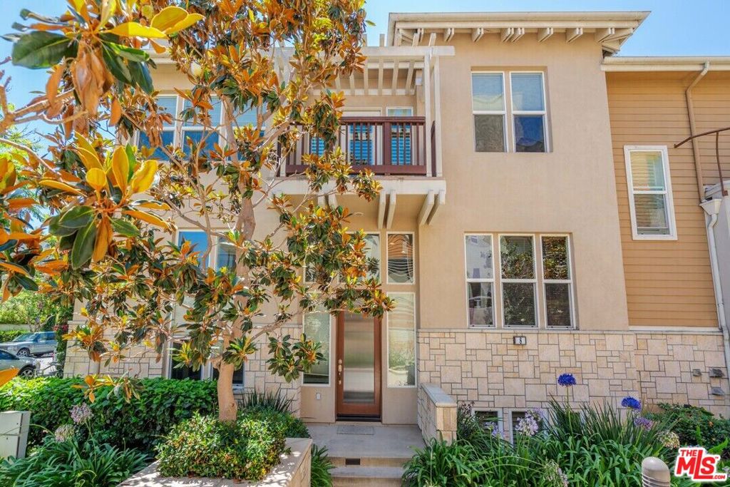 Be captivated by this chic and contemporary corner unit in one of Playa Vista's best complexes highlighted by exquisite finishes and state-of-the-art amenities. Bathed in natural light and upgraded to perfection, this 2 bedroom 3 bath plus den/media room with built-in surround sound is a treat for the entertainer who demands space and quality in an unparalleled locale can be used as a 3rd bedroom. Stainless steel appliances including a Viking cook-top, maple cabinets, granite center island, built-in wine refrigerator, and marble floors enhance the dramatic kitchen while French doors open onto the terrace which is perfect for al-fresco dining or intimate gatherings. A wall of towering casement windows punctuates the spacious living room featuring gleaming hardwood flooring and gas fireplace, and the glamorous primary suite is warmed by a gas fireplace and offers a seductive marble bath with dual vanities and a large walk-in closet. The 2nd en suite bedroom will not disappoint and tucked away downstairs is the media and laundry rooms with side by side washer/dryer and direct access 2-car garage. Designer details include crown moldings, tasteful ceiling fans, recessed lighting, and custom window coverings throughout. Enveloped by a plethora of restaurants and shops/Whole Foods Market at the Runway combined with exclusive access to the main clubhouse, numerous pools and recreation center.