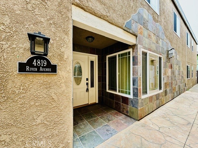This lower unit single story 3-bedroom 2.5 bath condo was built in 2007 and is being updated in April 2020 with new wood floors, new blinds and new paint. It is located 3 houses from the beach on the Peninsula in Newport Beach at 48th Street and River Ave. The unit has its own private enclosed yard area. The unit comes with a private garage and an additional parking space as well as washer/dryer in the unit, travertine floors, granite countertops, stainless steel appliances, including refrigerator. The unit has extremely high-end finishes throughout including crown molding, granite fireplace, and all new plumbing, heating and electrical. It is available September 1st for a one-year lease or longer.