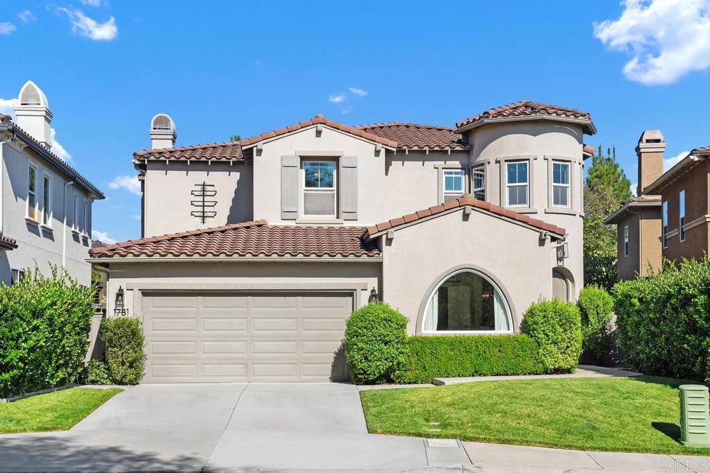 Experience refined living in this completely reimagined residence in the desirable Venzano community. Thoughtfully remodeled inside and out, this 4-bedroom plus optional 5th/bonus room, 4-bath with office home, offers versatility for today’s lifestyle. Step inside to find wide-plank luxury vinyl flooring, custom board & batten moldings and a light-filled open floor plan. The designer kitchen has been transformed with ceiling-height cabinetry, quartz countertops, farmhouse sink, custom range hood, large pantry closet and a shiplap ceiling that adds character and warmth. A new fireplace surround, curated lighting throughout and stylish finishes complete the modern design. This Plan 1 home boasts the largest living room space in the Venzano commuity! The main level also includes a private office, bedroom and shiplap-accented bathroom. Upstairs, the expansive primary suite opens to a private balcony with serene pool and mountain views. The spa-inspired bath features a freestanding soaking tub, walk-in shower, dual vanities, and a generous walk-in closet. Additional bedrooms and a flexible bonus/optional 5th room provides space for an additional living area, playroom or teen room! This spectacular home also features built-in speakers, a whole house fan, tankless water heater and leased solar which adds both convenience and efficiency. The backyard is a true retreat, perfect for entertaining or enjoying family -with a resort-style pool with Baja shelf and spillover spa surrounded by outdoor living and yard space, built-in speakers and covered patio! Situated on a flat cul-de-sac with a pocket park just steps away, this home offers privacy, community charm and modern upgrades at every turn. Living in Venzano, which is San Elijo adjacent, means a lower tax rate and HOA, while still enjoying access to award-winning schools, miles of gorgeous hiking trails, ball fields, parks, shops and dining just minutes away. Modern upgrades, timeless design and a coveted location make this move-in ready home a rare opportunity.