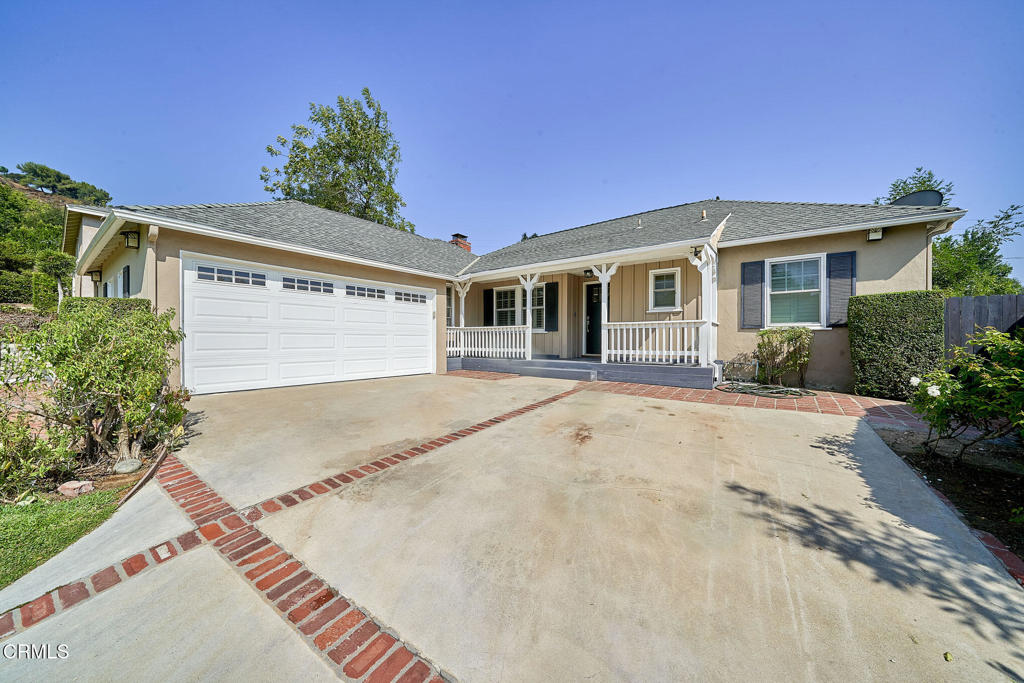This beautifully updated 3 bedroom, 3 bath home is located in the heart of La Canada, just minutes from PCY Elementary, LCHS, and the areas top private schools. It offers a welcoming covered front patio, a spacious covered back patio, and a flat grassy yard perfect for entertaining, complete with a playhouse that can remain or be removed upon request. Inside, the home features a large gourmet kitchen with abundant cabinetry and a generous center island, along with a bonus office space conveniently located next to the kitchen. All three bedrooms are spacious, and the bathrooms are well appointed. The home has been recently upgraded with a brand-new water heater, a one-year-old refrigerator, two Restoration Hardware chandeliers, a Vivint security system, a Nest thermostat, and a three-year-old washer and dryer. The backyard has new pavers, a privacy fence, and artificial grass, along with an updated Wi-Fi sprinkler system. A one-year-old garage door motor and a new water softener system have also been installed, and all rooms are freshly painted. The owners are looking for a tenant with excellent credit and reliable, documented income.