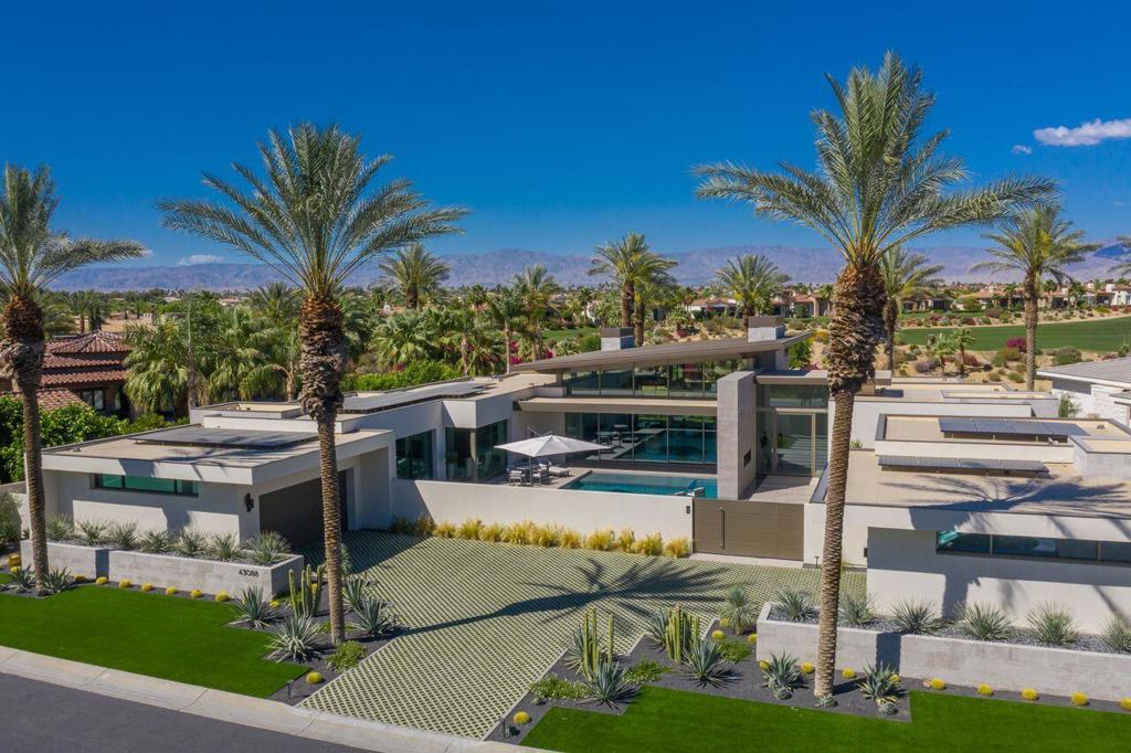 *ARCHITECTURAL BRILLIANCE MEETS DESERT LUXURY*Welcome to this custom built masterpiece in the prestigious Toscana Country Club.This bold statement redefines Desert Elegance. Completed in 2018, this 5,750-square-foot showpiece is a fusion of cutting-edge design and luxurious comfort, perfectly positioned to capture sweeping fairway and mountain views.From the moment you enter, you're greeted by soaring 20-foot ceilings and dramatic walls of glass that flood the space with natural light and frame the stunning landscape beyond. The open-concept layout flows effortlessly through a gourmet kitchen, spacious family room, elegant living room, and formal dining area, each space crafted for both grand entertaining and relaxed everyday living. This home features 4 bedrooms, 4.5 baths, a casita (one bedroom in a detached casita). There is also a separate office.Every guest suite is ensuite and opens to the south facing pool/spa creating a seamless indoor-outdoor experience. This award-winning residence is more than a home, it's a statement. A rare opportunity to own a piece of modern artistry in one of the desert's most exclusive country clubs.