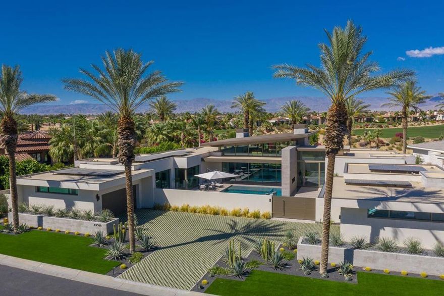 *ARCHITECTURAL BRILLIANCE MEETS DESERT LUXURY*Welcome to this custom built masterpiece in the prestigious Toscana Country Club.This bold statement redefines Desert Elegance. Completed in 2018, this 5,750-square-foot showpiece is a fusion of cutting-edge design and luxurious comfort, perfectly positioned to capture sweeping fairway and mountain views.From the moment you enter, you're greeted by soaring 20-foot ceilings and dramatic walls of glass that flood the space with natural light and frame the stunning landscape beyond. The open-concept layout flows effortlessly through a gourmet kitchen, spacious family room, elegant living room, and formal dining area, each space crafted for both grand entertaining and relaxed everyday living. This home features 4 bedrooms, 4.5 baths, a casita (one bedroom in a detached casita). There is also a separate office.Every guest suite is ensuite and opens to the south facing pool/spa creating a seamless indoor-outdoor experience. This award-winning residence is more than a home, it's a statement. A rare opportunity to own a piece of modern artistry in one of the desert's most exclusive country clubs.