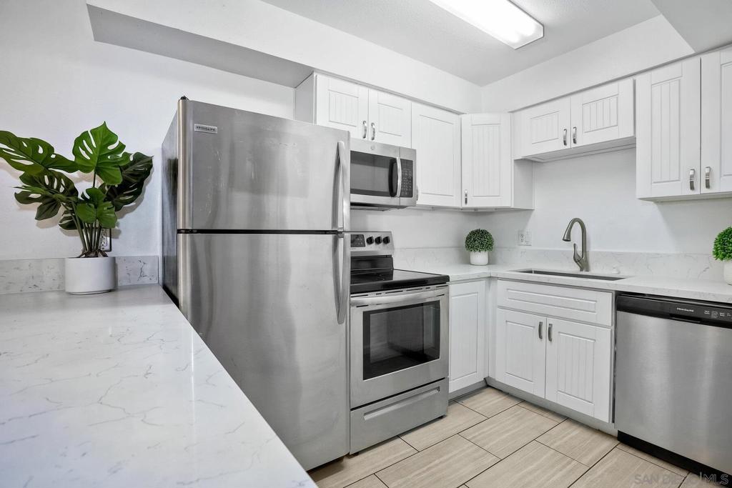 VA APPROVED COMPLEX!!! REMODELED 2 Bedroom Condo with BALCONY and NEWER Stainless Steel APPLIANCES! Newer CABINETS, Newer QUARTZ COUNTERS, PAINTED AND REMODELED BATHROOMS! OPEN FLOOR PLAN with Bedrooms on Each Side of Unit - Perfect for Roommate Situation! Beautiful Flooring Throughout! Pet Friendly Community with POOL, REC ROOM and BBQ AREA! Walking Distance to SDSU, Trolley, Freeways and Restaurants!!! Complex is Fully Gated for Security! Near Cowles Mountain, Lake Murray and Mission Trails!!! Complex Features: , Equipment: Dryer, Range/Oven, Washer Sewer: Sewer Connected Topography: LL