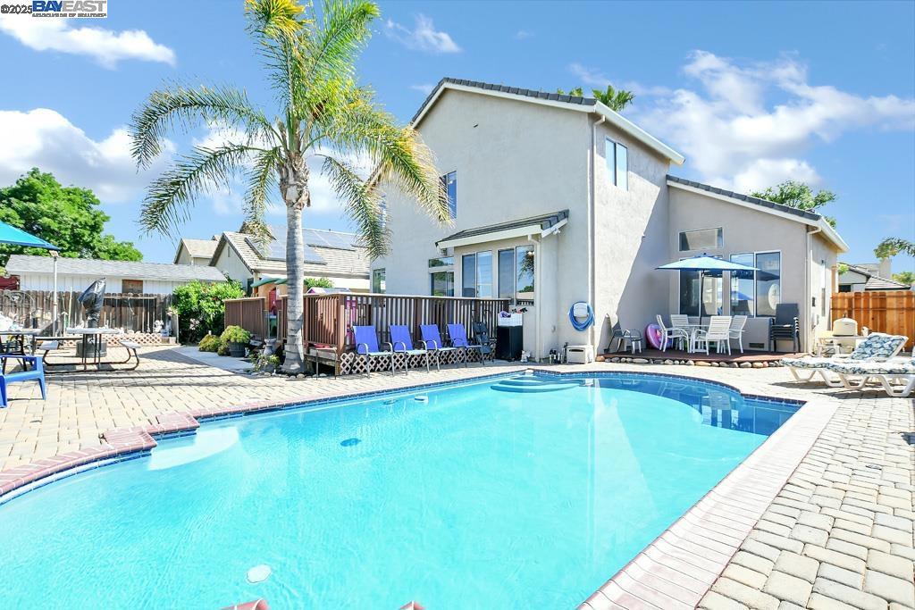 Welcome to this beautifully updated traditional home featuring 4 bedrooms and 3 bathrooms, nestled in the heart of Discovery Bay. Enjoy new laminate flooring, fresh interior paint, and a spacious, flowing floor plan designed for comfortable living and entertaining. Step outside to a stunning backyard complete with a sparkling pool, a large deck perfect for gatherings, and plenty of room to relax or play. Located just minutes from the Delta waterways, local shops, and popular restaurants—this home offers the perfect blend of convenience and lifestyle. Whether you're all about weekend boat rides or laid-back nights under the lights—this is your kind of place. Don’t miss the opportunity to make this entertainer’s dream your own!