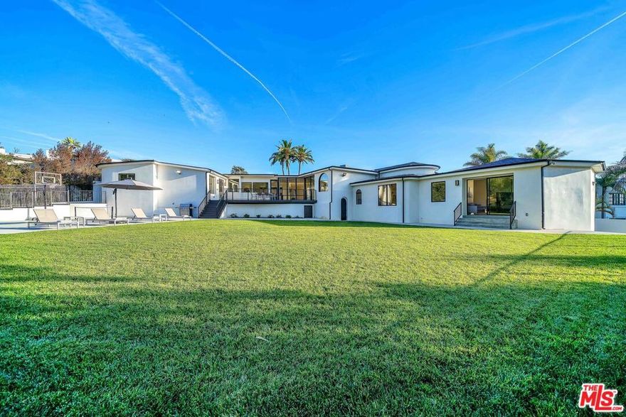 Quiet enclave in the palisades with ocean breezes and mountain views in the desirable Castellammare neighborhood. This completely remodeled, stunning resort style home with open floor plan stretches over two lots and over 5000 sqft of living space. Beautiful scenic manicured grounds and expansive decks and terrace create the most desirable setting for indoor-outdoor living.  Equipped with top-of-the-line appliances and center island the chefs kitchen sets the tone for this high end entertainers house. With 5 bedrooms and 5 bathrooms, this home has everything you need for you and your guests. Close proximity to Malibu shops  and beach access.