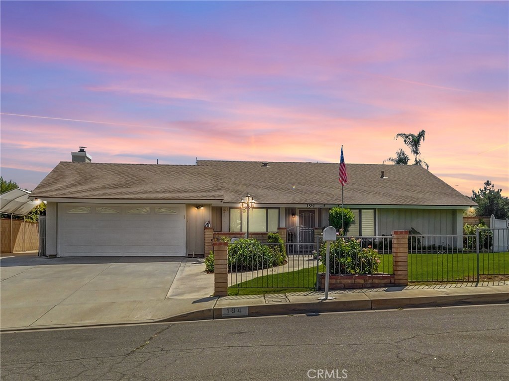 Spacious 5-bedroom, 3-bath home on an expansive 14,000+ sq. ft. cul-de-sac corner lot with a sparkling in-ground pool! This property includes a versatile approx. 550 sq. ft. room addition featuring its own living area, the 5th bedroom with a walk-in closet, and a bathroom—ideal for in-laws, a teen suite, office, or guest quarters. A covered breezeway seamlessly connects the main house and addition. Inside, you’ll find both a living room and a large family room with soaring wood ceilings, dual ceiling fans, and a cozy brick fireplace. The updated kitchen boasts quartz countertops, stainless steel appliances, recessed lighting, gray cabinetry, and extended built-in shelving. The primary suite offers a walk-in closet, private bathroom, and slider to the backyard. Another bedroom is currently outfitted as an office with custom built-ins. Enjoy outdoor living with a huge fenced backyard featuring a pool (also additionally fenced), covered patio with lights, firepit, bar area, and sheds for pool equipment and the included ride-on mower. The oversized lot also provides a spacious front yard, ample driveway parking, and extra side parking for another small car. Additional highlights include a newer roof (approx. 5 years), direct access 2-car garage with laundry hookups, and minimal carpet—only in the family room, the rest is either hardwood floors or laminate. No HOA. This home blends everyday comfort with plenty of space for entertaining, offering flexible living options and room to grow.