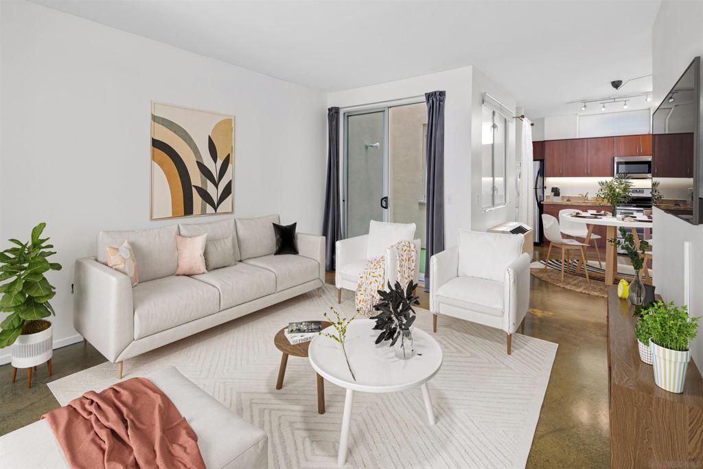 Welcome to 1601 Kettner Boulevard #5, a unique live-work loft situated in the vibrant neighborhood of Little Italy. This exceptional property is part of a prestigious complex designed and built by the renowned and award-winning architect, Jonathan Segal. As a resident of this condo, you'll have the incredible opportunity to experience the bustling downtown scene of San Diego right at your doorstep. One of the standout features of this residence is its live-work loft design, offering a versatile space that combines the comfort of a home with the functionality of a workspace. The clean modern lines and polished concrete floors exude a contemporary urban feel, creating an atmosphere perfect for both relaxation and productivity. The unit has been updated with modern appliances and boasts a recently installed Bosch washer and dryer for your convenience. Located within a gated community comprising 31 units, this loft provides a unique living experience in one of downtown San Diego's most sought-after locations. Just a short stroll away, you'll discover the lively Little Italy Piazza Famiglia, where an abundance of entertainment options awaits. Indulge in world-class dining, immerse yourself in vibrant nightlife, explore the weekend farmers market, partake in festivals, and enjoy live performances—all right at your fingertips. Thanks to its proximity to major highways and public transportation, commuting to work or exploring all that San Diego has to offer is a breeze. Whether you desire a dynamic urban lifestyle or work in the city, this residence truly embodies the essence