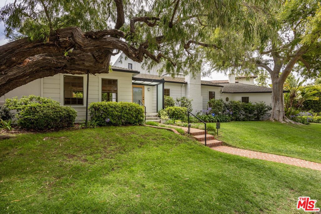 Located in the heart of prime Brentwood and on the market for the first time in over fifty years, this beautifully maintained home offers an exceptional blend of comfort and character. Featuring four bedrooms and three bathrooms, the residence includes a dramatic second living room with 20-foot ceilings and a lofted library/office, which could serve as an incredible screening room, family room and space to work from home. The home benefits from lots of natural light, with seven skylights and expansive windows throughout. Additional highlights include a pool, a Japanese-style soaking tub, and a detached garage. Enjoy an unbeatable location, just moments from San Vicente and Brentwood Village. Easy to show.
