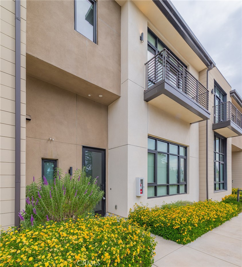 Very beautiful and contemporary condo in the heart of Acadia*in a gated community*minutes drive to the Arcadia Mall and Santa Anita Park*This beautiful split level condo. features 3 bedrooms*2 1/2 bath*when you enter the glass window entry door*there is 2 story high ceilings great room with lots of windows*a few steps up to the open kitchen with refrigerator and stainless steel appliances with lots of cabinets and counter spaces and dining area* there are two balconies in this level*all bedrooms are in the upper level*master suite with sitting balcony and large sliding windows*double sinks vanity and a full bath and a separate shower*walk-in closet*the other two good sized bedrooms with a full bathroom and double sinks vanity*from the front entry a few steps down to the powder room and laundry room equipped with washer and dryer* and two car garage with direct access*easy freeway 210 access*must see to appreciate*seller is anxious to sell will listen to all reasonable offers!*some of the photos are virtual staging only no real staging furniture at all*