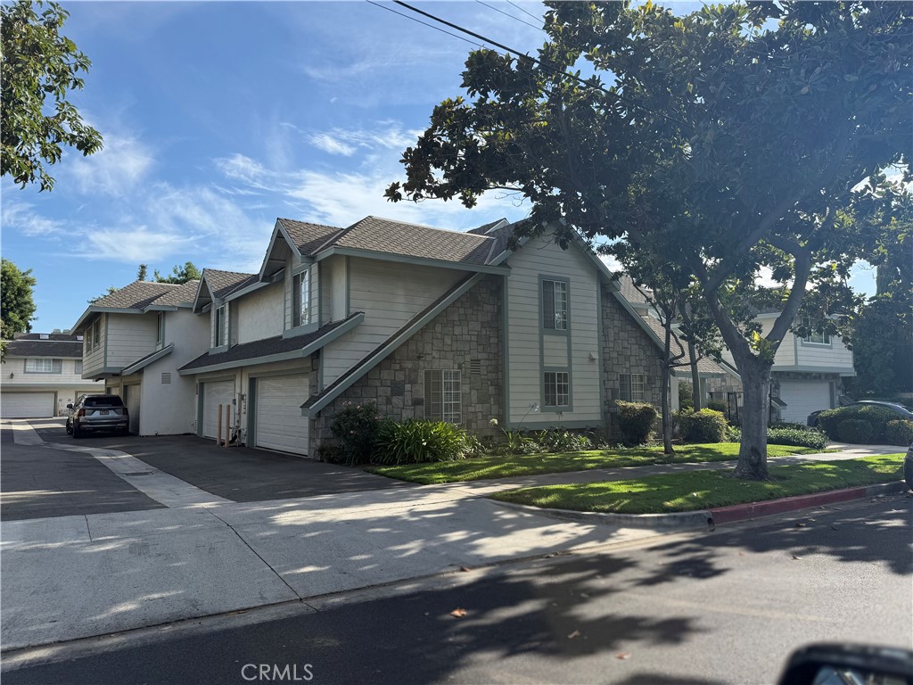 Turn key Tudor style which is fully remodeled. This is a end unit and located deep in the back of the complex for and very private. This home is located near Main Place Mall and St. Josephs Hospital and all major freeways. Complex contains a built in BBQ and Spa