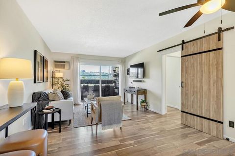 Photo of 6725 Mission Gorge Rd #305B, San Diego, CA 92120 (MLS # 260010040SD)