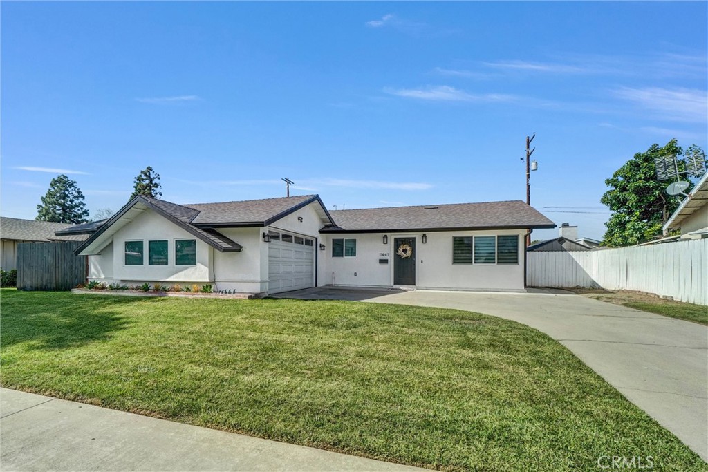 Absolutely stunning one-of-a-kind showstopper, meticulously renovated from the ground up with over $200,000 in high-end modern upgrades. Taken down to the studs and thoughtfully reimagined, this now 3-bedroom + bonus room home offers an additional 225 sq ft of living space, perfect for a home office or play room. Every inch of this home has been transformed with quality and style in mind. You’ll find a brand new roof, upgraded 200-amp electrical panel, all-new copper and PEX plumbing, a high-efficiency HVAC system, dual-pane windows, and a whole-house water softener system — just to name a few. Step inside to an open, airy floor plan featuring luxury laminate flooring, fresh interior and exterior paint, and a charming electric fireplace that adds a cozy touch to the spacious living area. The heart of the home is the gourmet kitchen, outfitted with Samsung appliances, a massive center island with seating for six, quartz countertops, and modern cabinetry — ideal for both everyday living and entertaining. Slide open the oversized patio door and step into your private backyard oasis, complete with a covered patio and beautiful landscaping with irrigation — perfect for weekend BBQs or evening relaxation. The primary suite is a true retreat, offering a generous walk-in closet and a spa-inspired en-suite bathroom with elegant finishes. The attached 2-car garage features brand new epoxy flooring, garage door, and an EV charging station, adding even more functionality to this impressive home. Additional features include: Custom window shades throughout, modern lighting fixtures, recessed lights, and a large shed in the backyard for additional storage. With the oversized backyard, there is a huge potential to add an ADU. This home is turnkey, modern, Smart-powered and absolutely packed with upgrades — all in a fantastic Garden Grove location close to schools, shopping, and freeways.