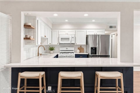 Photo of 14159 Riverside Drive #103, Sherman Oaks, CA 91423 (MLS # SR26154347)
