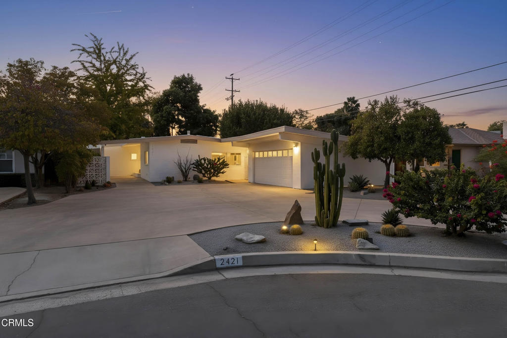 Eichler-inspired mid-century custom home in Westchester's charming downtown neighborhood, ideal as an investment or short-term rental. The original mahogany cabinetry, built-ins, and paneling have been beautifully restored. The light-filled main living area opens to a concrete courtyard, raised planter and above-ground spa. Enjoy a unique pumice stone fireplace, wood-look tile flooring, oversized bedrooms, newer dual-pane windows, and custom window shades. The kitchen features quartz countertops, sleek mahogany cabinets, and stainless-steel appliances. A professionally designed desert landscape blends with mature fruit and deciduous trees. Recent upgrades include a new drip and deep-root irrigation system, custom teak wood gates, and concrete lounge areas. A spacious circular driveway and 2-car garage offer ample parking for guests. (See Realtor Highlights and photos for more details.)
