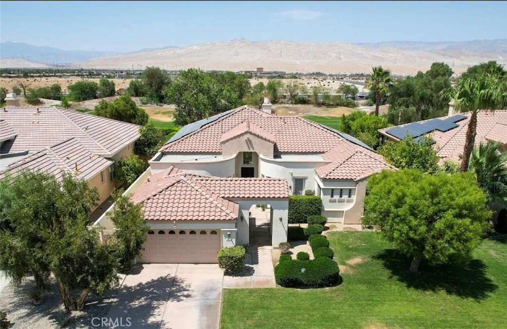 Welcome to your Dream Home located in the prestigious and 24 hour guard-gated Mira Vista Community of Rancho
Mirage . This stunning home offers 3 spacious bedrooms, 3.5 bathrooms with its private entrance, guest powder room , formal dining room & spacious living room with wet bar, and a dual-sided fireplace that brightens the living area and the adjacent retreat/office.
The master suite opens to the serene patio and pool area. The spa-like master bathroom includes a private walk-in shower, dual sink and two large walk-in closets.
The lush backyard oasis invites you to enjoy the tranquil palm trees, shimmering pool, and spa for a luxurious respite.
This home is ideally located in the the famed Gary Player Golf Course at Mission Hills , and just minutes from retail, dining, and hotels . Sustainability is a plus, with a 42-panel solar system fully paid in advance , low monthly HOA includes basic cable & internet, and the entire home, including the bathrooms and kitchen, features waterproof flooring throughout, step-free design, it offers both ease of living and low maintenance convenience. This property is ready for you to start enjoying the ultimate country club lifestyle.