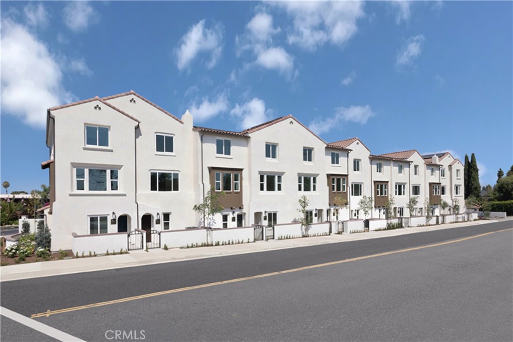 Tesoro Walk is a new gated community, located in the City of Downey, featuring 33 beautiful townhomes.
This Emerald floorplan features a two-car side-by-side garage, and a spacious flex space with powder bath on the first level. That flex space makes for a perfect home office or workout space. The second floor is your main living level and features an incredible open kitchen, with an oversized island and walk-in pantry, a separate dining area and living room and an outdoor deck. On the upper level you'll find a conveniently located laundry room, your large primary suite with walk-in closet and two secondary bedrooms.