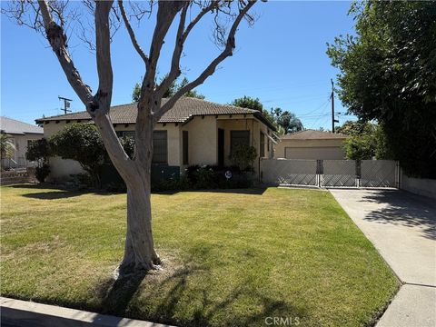 Photo of 393 Country Club Ln, San Bernardino, CA 92404 (MLS # CV26055099)
