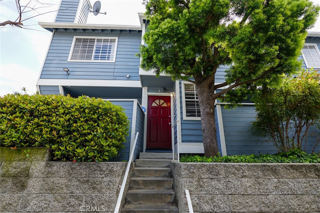 Beautifully upgraded 3 bed / 3 bath condo in gated Harbor City community! This two-story home features wood floors throughout, recessed lighting, and a spacious living room with cozy gas fireplace. The kitchen boasts granite countertops, upgraded cabinets, and plenty of storage. Upstairs includes a large master suite plus two generous bedrooms. Enjoy an attached 2-car garage with laundry hookups. Community amenities include pool and guest parking. Prime location near parks, shopping, schools, and freeway access — all just minutes from the beach!