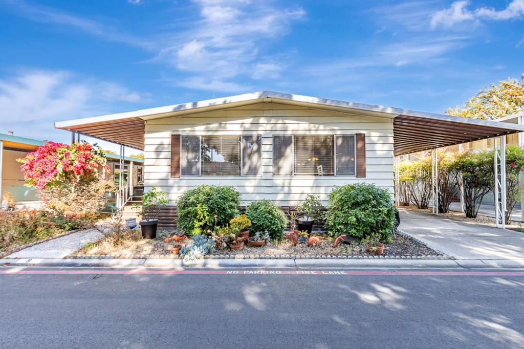 Welcome to this charming home located in the heart of Sunnyvale. Located in the desirable Senior 55+ community of Fox Hollow with a spacious 1,610 sq ft layout. This home offers 2 bedrooms and 2 full bathrooms, perfect for comfortable living. The kitchen is equipped with modern amenities including 2 built-in ovens, a large pantry cabinet, and gas range, making meal preparation a delight. The dining room has a built-in China cabinet with abundant cabinet space and it is situated adjacent to the living room. Kitchen is bright and airy with a breakfast bar. The flooring consists of laminate and tile, offering both durability and style. Central forced air heating and air conditioning. Laundry needs are effortlessly met with the in-house facilities. This home is nestled in a well-maintained community that offers residents access to great amenities, including a clubhouse, swimming pool, and regular social events. Conveniently located near multiple shopping centers, Baylands Park, Light rail, Highways 101 and 237. Embrace the opportunity to own this delightful property in a vibrant community.