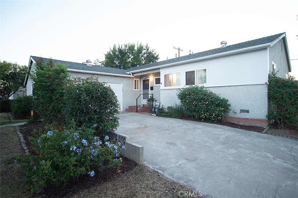 Come home to this charming 3 bedroom, 2 bathroom Single Family Residence. This home has a combined dining area and living room, kitchen nook, and direct access to an attached 2-car garage. Nice backyard with fruit tree and grapevines. Located in a corner lot, walking distance from a shopping mall and restaurants. Close to an amusement park, golf course, and schools. House has Solar panels (Power Purchase Agreement).