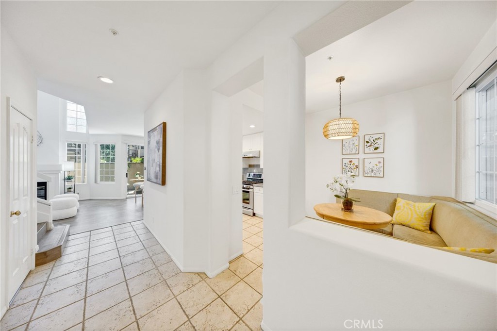 * One of Best Deals in Town !!! * 3 Beds and 3 Baths in Prime Tustin Ranch * One Bedroom with full bathroom Downstairs *** Most convenient location walking to Marketplace*** Best Schools - Beckman High, Pioneer Middle *** Step into style and comfort at 13445 Savanna, a beautifully updated 3-bedroom, 3-bathroom townhouse nestled in the highly sought-after Arcada community of Tustin Ranch. Boasting a bright, open floor plan with soaring ceilings and an abundance of natural light. The contemporary kitchen is equipped with sleek appliances, generous cabinetry, and a charming breakfast nook. The spacious living and dining areas flow effortlessly to a private patio—ideal for morning coffee or evening gatherings. A rare and convenient main-level bedroom with a full bath provides flexible living options for guests, home office use, or multi-generational needs. Upstairs, you’ll find well-appointed bedrooms and baths, including a serene primary suite designed for comfort. The two-car garage adds security and ample storage. Enjoy resort-style living with a sparkling pool, spa, and BBQ area surrounded by lush landscaping. Located in the heart of Tustin Ranch, you’re just minutes from top-rated schools, scenic parks, Tustin Ranch Golf Club, and the vibrant Tustin Marketplace offering premier shopping, dining, and entertainment. This turnkey townhouse combines location, lifestyle, and luxury—don’t miss this opportunity!