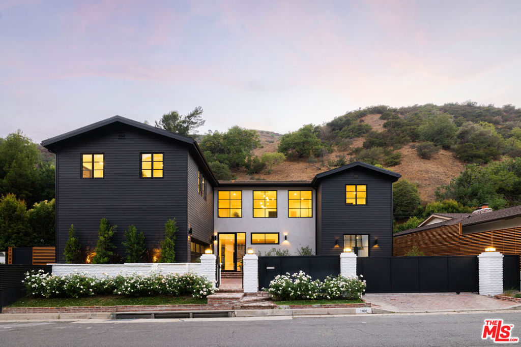 Set on over half an acre in Beverly Hills, this exceptional 6-bd, 6-ba estate offers nearly 6,000 sq ft of thoughtfully designed living space, masterfully crafted for luxury, comfort, and style. Surrounded by lush nature, this newly built home is just moments from the scenic trails of Franklin Canyon Park, the family-friendly playgrounds of Coldwater Park, and only minutes from the world-renowned shopping and dining of Rodeo Drive. Step inside to discover a truly one-of-a-kind design with every detail expertly curated to blend timeless elegance with modern sophistication. Expansive living areas, oversized bedrooms, refined finishes, and a seamless indoor-outdoor flow create an ideal setting for both relaxed living and stylish entertaining. Private, elegant, and perfectly located this is one of Beverly Hills' finest homes. A rare opportunity not to be missed.