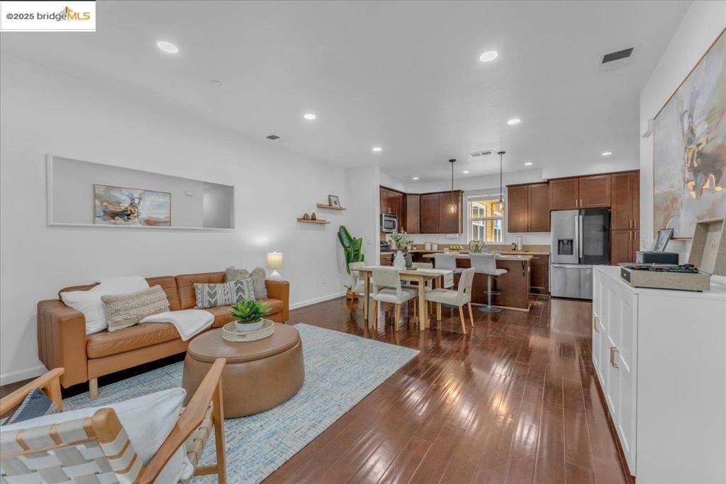 The charm and convenience of this Cannery home is unmatched. This modern townhouse boasts an open floor plan with 2 bedrooms, 2.5 bathrooms and 1,227 square feet of living across three levels. In the heart of the home, enjoy a sleek kitchen with granite countertops, a spacious island and stainless steel appliances. Meanwhile, just outside is where you can take in all the greenery of the community - from tree lined streets to maintained walkways and local parks, and most notably the Cannery Water Tower Park just a minute away. Situated perfectly off of 880 with easy access to 92, and near public transit such as BART and Amtrak, you’ll be just minutes away from local shopping and dining while enjoying some of the most convenient daily commutes there can be. This combination of urban convenience and suburban charm awaits!