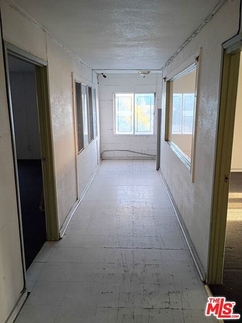 Photo of 1610 N Willowbrook Avenue, Compton, CA 90222 (MLS # 25627115)