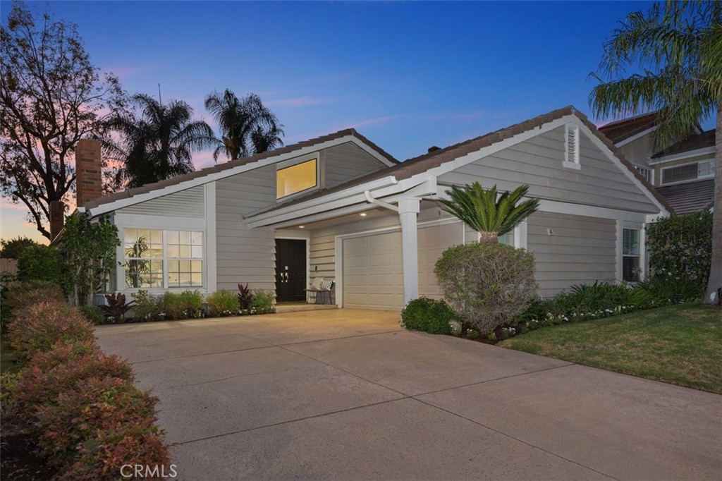 Location, location, location! Nestled in the heart of Irvine’s Gated Northwood neighborhood, 8 Recodo is a unique Single-Story home situated on a quiet cul-de-sac next to the famous Hicks Canyon Trail. With its back facing a lush green park and no neighbors behind, enjoy unmatched privacy. This home is a charming 4-bedroom, 3-bathroom home with a spacious driveway and thoughtful design. Built for natural light, cathedral ceilings and abundant windows gives the living areas a bright, inviting feel that flows throughout the open-concept home.
Enjoy over $210K in permitted renovations, including wide-plank European Oak wood flooring, additional bathroom, and whole house PEX repipe. Other upgrades include new recessed lighting, all-new windows and sliding glass doors.
The newly remodeled kitchen features all-new appliances, sleek quartz countertops, and custom cabinetry. Minimalist pendant lighting accent the spacious center island. Overhead, a skylight illuminates the space. Fireplaces in the dining area and sunken living room completes the space, inviting cozy conversation.
The primary suite is a true retreat with its high ceiling, dual vanities, and walk-in closet. Above the shower, a skylight allows sunlight to stream down, filling the space with natural warmth and glow. Glass double doors look out to resort-like views of freshly renovated pebble surface pool. All bathrooms have been newly remodeled, featuring modern barn-door glass walk-in showers, and bidet toilets for added comfort.
8 Recodo is a block away from Santiago Hills Elementary School, and just minutes from Northwood Town Center, featuring Zion Market, and Northpark Plaza, home to HMart and a variety of shops and dining options. This rare single-story gem is the epitome of privacy and convenient Irvine living.
