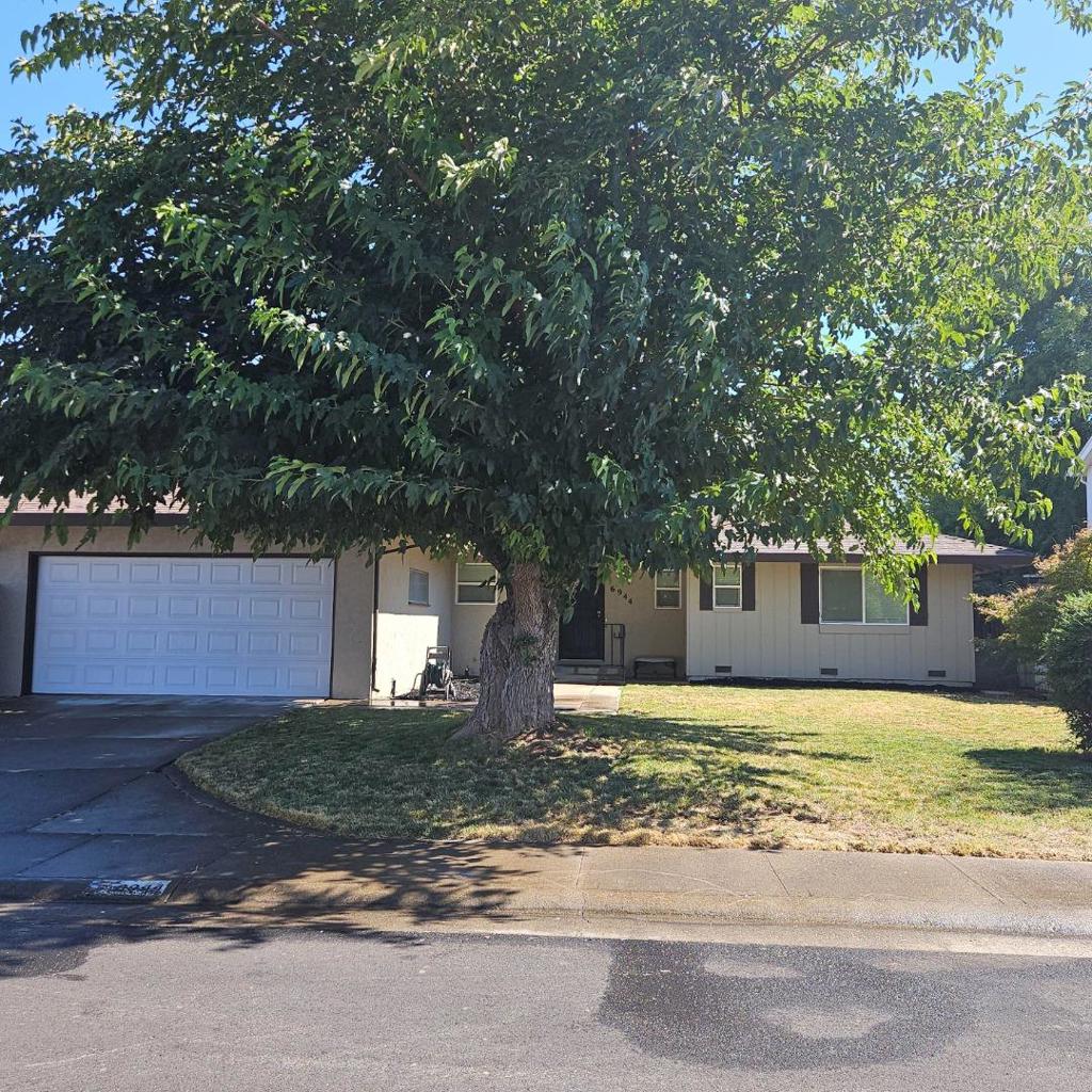 Welcome to a beautiful, charming single-level home in a quiet neighborhood. Newly updated with dual pane windows, window coverings, flooring throughout, quartz kitchen counters, recessed lighting, bathroom vanity/tops, closet/bedroom doors, ceiling fans, recessed lighting, garage door/opener, and insulation. Interior, exterior and gutters newly painted. Large entry way and hall closets provide extra storage. Central heat and air. Home features a spacious layout, providing ample space for living and entertaining. The cozy family room has a fireplace and built-in cabinet/bar with sink for social gatherings. The kitchen boasts modern appliances and plenty of storage. The backyard offers a newly patio and cover for your relaxation. Don't miss the opportunity to make this house your home!
