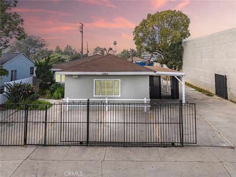 Photo of 12815 S San Pedro Street, Los Angeles, CA 90061 (MLS # OC25277709)