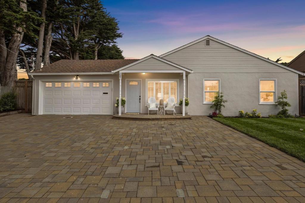 Let the story begin with Curb Appeal. A coastside gem, absolutely stunning to see, exploding with character and charm. Situated on a large 7278sf lot at the end of the road, one can only imagine the enjoyment and comfort it promises. 1066 SF+/- primary residence plus 281 SF+/- multi purpose-sunroom. Colorful peaked roofs, distinctive landscaping, sweeping paved driveway, shuttered windows, and raised entrance. Gleaming hardwood floors with an explosion of natural light throughout. Easy flow to the kitchen with its stainless appliances, stylish counters and plentiful cabinetry, highlighted with a wonderful view of the private yard. On one side of the home rests three delightful bedrooms, comfortable in size with convenient access to the spacious hall bath. Additional half bath and bonus multi purpose room with an array of windows and a glass door opening to the sprawling yard. Park-like backyard with real grass, pavers and gravel walkways filling the space. New electrical (2022) new roof (2022), recessed lighting, dual pane windows and EV charger. Attached oversized 2 car garage. An overall remarkable location, near schools, shopping, hiking trails, beach access and transportation, this home is perfect for the everyday enjoyment of coastside living. A must see!