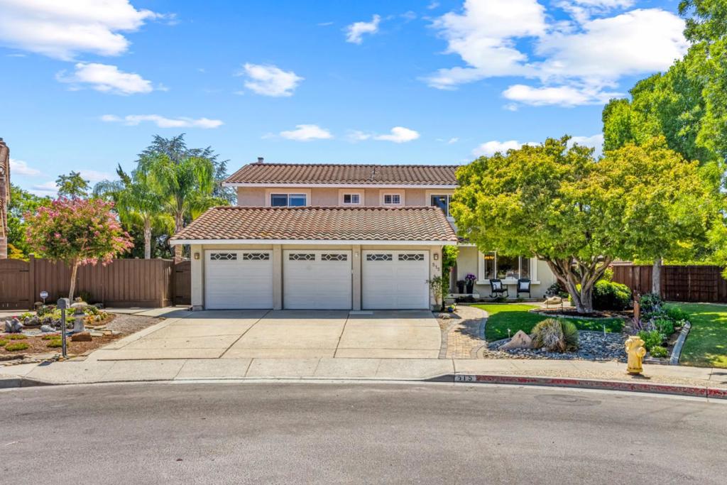 Your dream home is available! Located at the end of a quiet cul-de-sac in the sought-after Paradise Valley neighborhood, this property is a must-see. Enter into a welcoming updated interior that exudes charm. This home features separate living & dining rooms ideal for entertaining. The heart of the home is the kitchen, with a casual dining area & an adjoining family room both overlooking the expansive yardperfect for gatherings. The immaculate home has 5 generously sized bedrooms, including a first-floor bedroom currently used as an office. The other 4 bedrooms are upstairs, 3 of which have walk-in closets. Step outside to your spacious & private backyard, which offers an abundance of features. There is the heated pool & spa, perfect for year-round enjoyment. Take a swim, refine your golf skills, & chip over the pool to the putting green. Relax on the raised deck or take a nap poolside in the shade. A secluded garden offers the potential for farm-to-table events. Dine alfresco on the covered patio, with a built-in grill & food prep area with a pass-through window to the kitchen. After your meal, unwind by watching the outdoor TV, or enjoy the sunset around the fire pit. This property offers breathtaking mountain views that can be enjoyed from various spots in the house & yard.