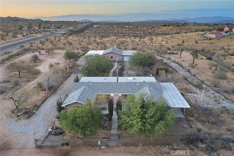 Photo of 979 Old Woman Springs Road, Yucca Valley, CA 92284 (MLS # JT26105095)