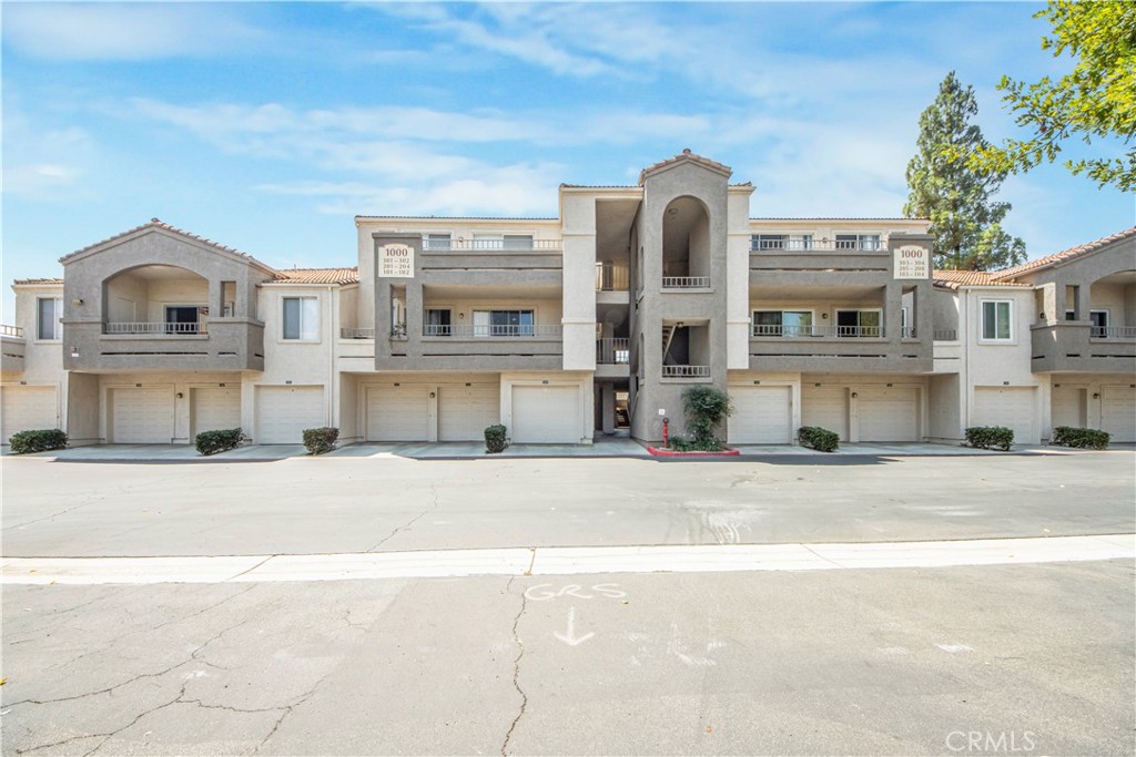 Triana at Corona Ranch community has its most affordable home now available, located in the very desirable Corona Hills! This ground floor end unit condo features 1 bedroom and 1 bath with a spacious open floor plan. Main living area opens to a private porch area, perfect for relaxing or entertaining with your custom surround sound speakers in living and bedroom area. The master bedroom also opens to the porch area, allowing for multiple access points. The kitchen has granite countertops, upgraded cabinetry, and a stainless steel appliances. Laundry closet inside is a huge plus. The bathroom also offers granite countertops and plenty of storage area. The master bedroom includes a walk-in closet. 1 car garage space is also a plus and tons of visitor parking for you to enjoy. Residents have access to beautiful community amenities including a sparkling pool/spa, fitness center, clubhouse, BBQ areas, and gated entry for privacy and security. Located minutes from shopping, dining, and major 91 and 15 freeways. Low property tax rate of 1.17% and monthly HOA fees of $352, covering community amenities, landscaping, trash, sewer, and water.