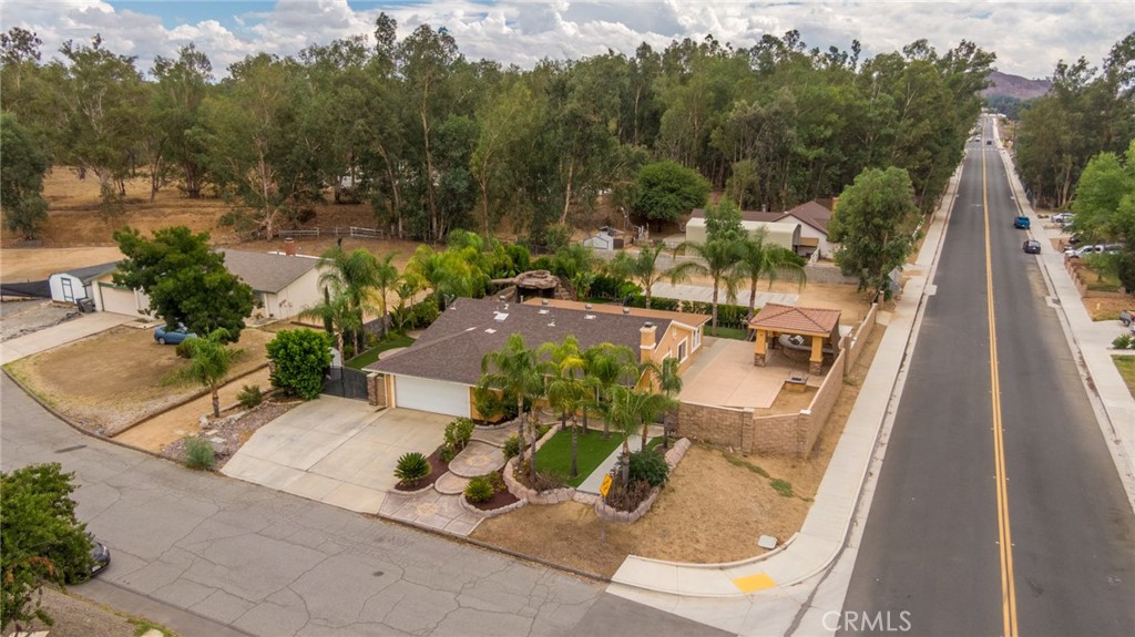 DON'T MISS OUT ON THIS AMAZING OVER SIZED CORNER LOT WITH POOL AND IN EXCELLENT LOCATION. JUST OFF THE I-15 FREEWAY WITH TWO ACCESS POINT FROM HIGHWAY 74 OR NICHOLS RD.
THIS PROPERTY TRULY HIGHLIGHTS A MASSIVE YARD ON A LOT JUST OVER 20,000 SF AND OFFERS 3-BEDROOM, 2-BATHROOM, ENCLOSED AND OPEN PATIOS, COVERED BBQ ARE WITH GAS APPLIANCE, A POOL WITH WATER SLIDE, AND THE MOST IMPORT AND DESIRABLE PART OF THIS PROPERTY IS THE PRIVATE CONTRACTOR'S YARD, WITH IT'S OWN PRIVATE ENTRANCE FOR SECURE PARKING. PROVIDING ENDLESS POSSIBILITES, AND YOU MAY EVEN ADD AN ADU.
CONVENIENTLY LOCATED IN WALKING DISTANCE TO TEMESCAL CANYON HIGH SCHOOL, RESTAURANTS, COSTCO, LOWE'S, WALMART, AND JUST THE OTHER SIDE OF THE FREEWAY IS HOME DEPOT, AND OFCOURSE, EASY ACCESS TO FREEWAY.
