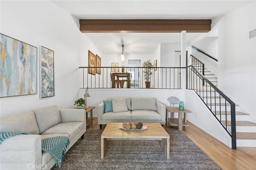 Location, Location, Location! Welcome to this stunning tri-level townhome in the highly desirable, gated Villa Velletri community of Marina del Rey. While some townhomes are located outside the gates with street access, this residence is ideally situated within the gated community, just steps from guest parking, offering rare convenience while maintaining privacy, security, and serenity.

This spacious and thoughtfully designed residence features vaulted ceilings, beautiful hardwood floors, and an abundance of natural light that fills the open living spaces. The split-level layout offers a formal dining area that overlooks a bright living room with a decorative fireplace (per HOA) and sliding glass doors that lead to an oversize private patio framed by lush greenery and mature pine trees—perfect for indoor-outdoor entertaining.

The kitchen features a sunny breakfast nook and has been updated with a new exhaust hood, new LG refrigerator, and new LG dishwasher. The breakfast nook connects to a versatile flex space, ideal for casual dining, a home office, or cozy media room.

Upstairs, you'll find two generous en-suite bedrooms, including a light-filled primary suite with high ceilings, a walk-in closet, and a private bath.

Additional features include direct access to a private 2-car garage with a versatile office or extra storage space—ideal for a home office, craft room, or yoga studio.

Villa Velletri offers peaceful, well-maintained grounds surrounded by over 480 mature trees, creating a tranquil, park-like atmosphere. The beautifully landscaped setting features 4 pools and spas, a clubhouse, and plenty of guest parking. Located just a short bike ride from the beach and marina, and within walking distance to trendy shops, gourmet restaurants, a grocery store, and movie theaters, it is an ideal location. Also enjoy the Friday afternoon Farmers Market held just across the street. This is a rare opportunity to enjoy coastal living in one of Marina del Rey’s most sought-after communities.
HOA dues at Villa Velletri include water, trash, high-speed Spectrum internet and cable, as well as earthquake and association insurance coverage.