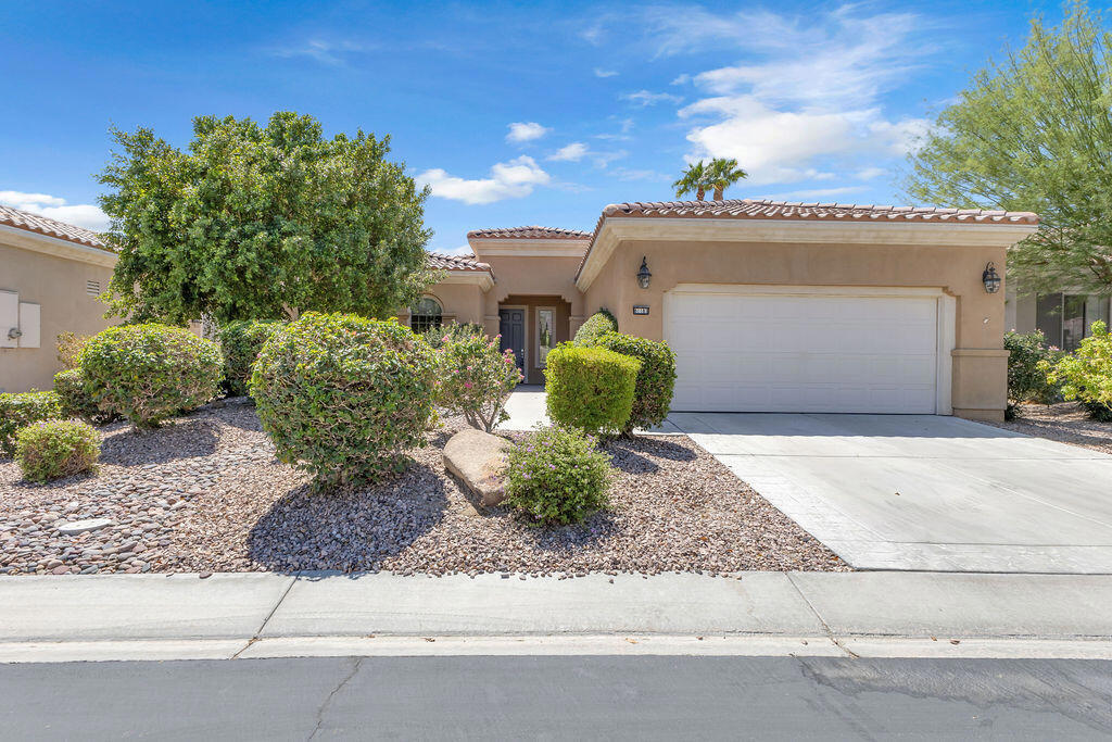 Charming 2-bedroom, 2-bathroom home located in the highly sought-after Sun City Shadow Hills community. This well-maintained property showcases pride of ownership throughout and features brand-new carpet. Perfectly situated on the 9th hole of the golf course, the home offers stunning views and is just short distance away from the clubhouse, restaurant, and pro shop. The inviting floorplan includes a spacious primary suite with a soaking tub, walk-in closet, and private bathroom. The guest bedroom and second bath provide comfort and flexibility for visitors or a home office. Enjoy indoor convenience with a dedicated laundry area, and entertain outdoors on the private patio complete with a built-in BBQ and sweeping golf course views. This move-in ready home combines comfort, convenience, and resort-style living in one of the desert's most desirable 55+ communities.