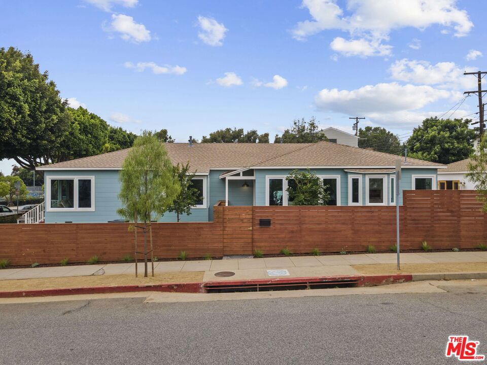 Beautifully remodeled luxury duplex in the north of Wilshire neighborhood consisting of two completely remodeled 2 bedroom homes each with their own laundry and professionally landscaped private yards. There is a separate large office for the 1054 25th Street home. The location is fantastic - walking distance to Douglas Park, Erewhon, Trader Joes, Whole Foods, Montana Avenue, the Brentwood Country Mart, and Franklin Elementary! Create your own magical compound with this stunning one of a kind property as a home, vacation home, work or rental investment in one of Santa Monica's best locations. Brand new high end kitchen and baths each with a unique design, custom cabinets, and built-ins. Spacious primary bedrooms. Large new windows with wonderful sunlight. New fencing. New systems throughout. This duplex is truly a unique and special opportunity to own two homes north of Wilshire on a corner lot with a separate office, garage and 2 additional open parking spaces.