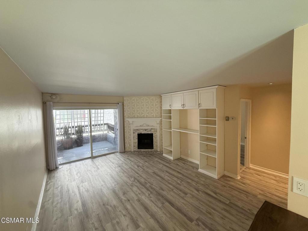 Welcome to one of the best units in the Del Rey Manor community! This 2-bedroom, 2-bath condo offers rare privacy with no shared walls and features a prime location--right next to the community laundry area and with a view of the pool.The open-concept floor plan creates a natural flow and an inviting vibe. The spacious living area includes a gas fireplace and direct access to a private patio--perfect for relaxing or entertaining. The primary bedroom features two closets and a private en-suite bath, while the second bedroom is thoughtfully positioned on the opposite side of the unit for added privacy.Additional highlights include laminate flooring throughout, two assigned tandem parking spaces in the garage, and a location that's less than half a mile from Playa Del Rey Beach--ideal for coastal living.Unit will be delivered unfurnished