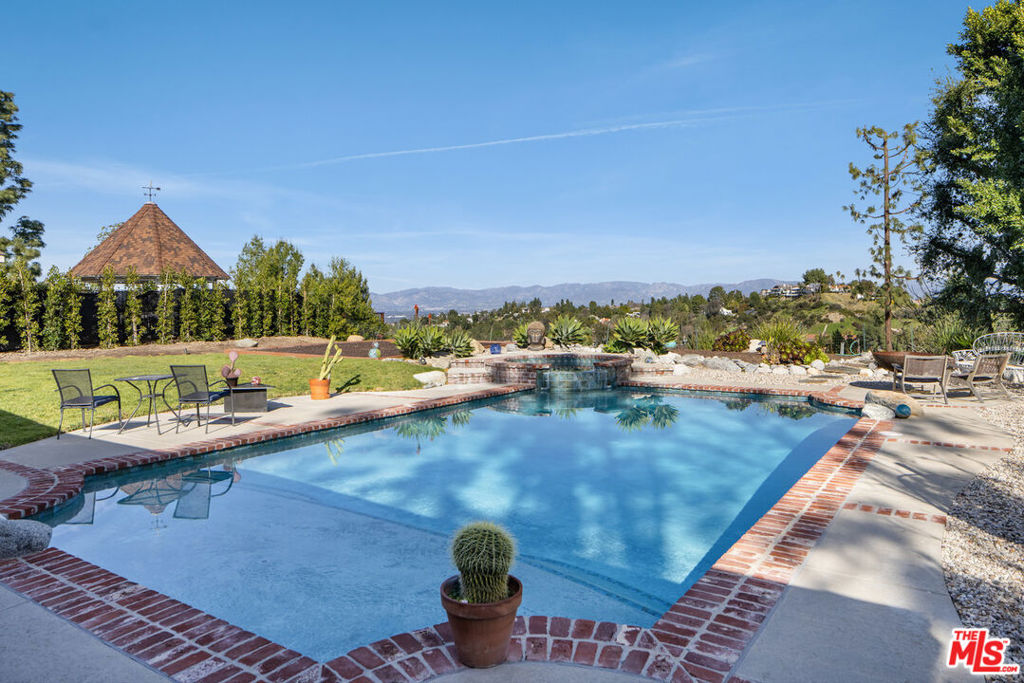 Stunning single story in prime Tarzana with sweeping mountain, city and golf course views. This house features four spacious bedrooms, plenty of entertaining spaces, and a backyard fit for any occasion starring a immaculately kept pool and jacuzzi. With no shortage of greenery and trees form nearly every window in the house, this home genuinely feels like a retreat from the city, while maintaining a close proximity to all of Tarzana's finest restaurants, shopping centers and amenities. Available for immediate lease.