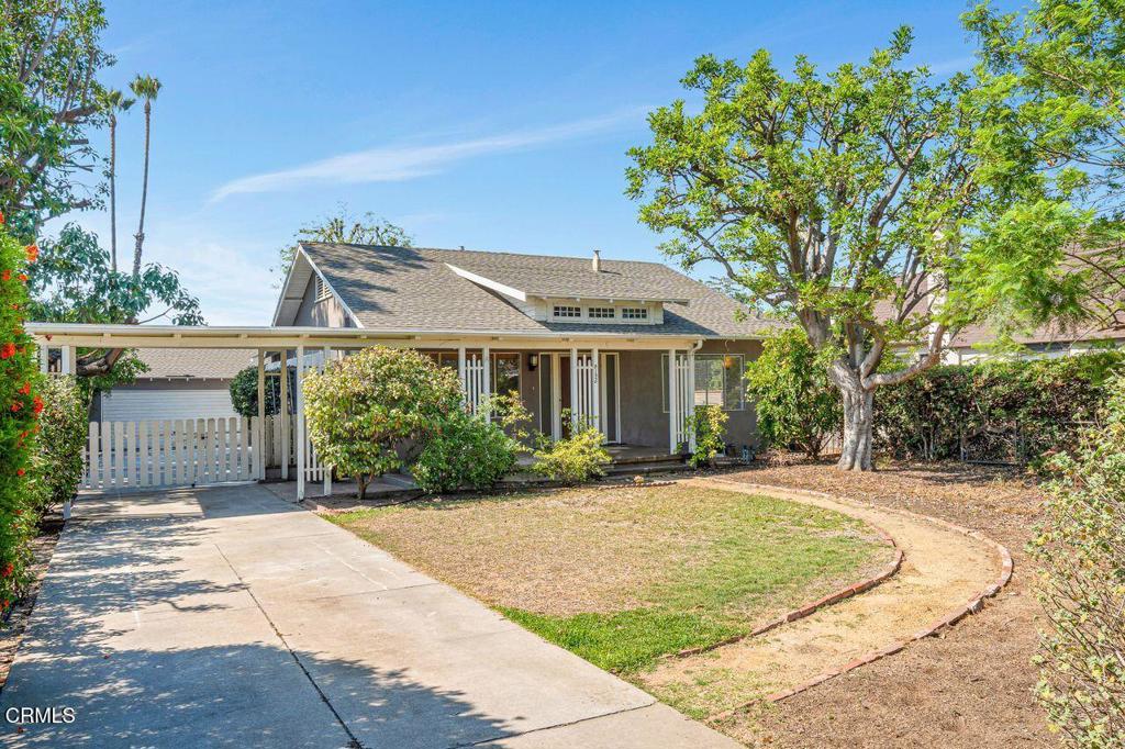 Welcome to your charming San Gabriel retreat! This mid-century bungalow offers a perfect blend of timeless character and modern comfort. Located in the award-winning Temple City School District, this home provides the privacy of a detached single-family residence with the convenience of a central San Gabriel Valley location.Step inside to discover a freshly painted, single-story home featuring hardwood floors, brand-new bedroom carpeting, and a spacious kitchen with quartz countertops and stainless steel appliances. The formal dining room opens to a covered patio, ideal for relaxing or entertaining.The property also includes a versatile detached two-car garage with an expansive bonus room and half-bath, perfect for a home office or studio. Enjoy mountain views from the front porch, a newly paved driveway with a carport, and beautifully landscaped grounds with a vibrant mixture of succulents, flowering plants, citrus, and mature trees. This home is complete with central AC and a separate laundry room. Move-in ready and bursting with appeal, this is a must-see!