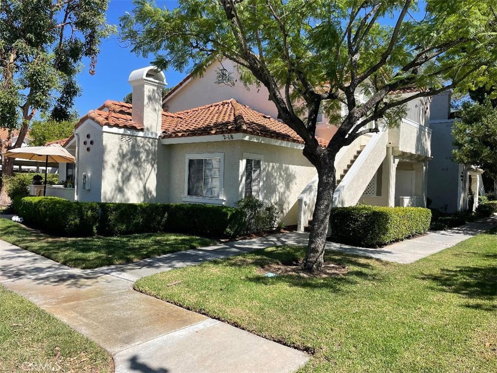 Completely updated home. New floor and paint throughout. New stove, oven and microwave. Like new stackable washer and dryer. New wooden shades. Conveniently located end unit with view of trees and near covered parking. It is quiet and surrounded by large trees and grass. Shopping center and restaurants very close. Community pool, spa, and playground are a short distance.