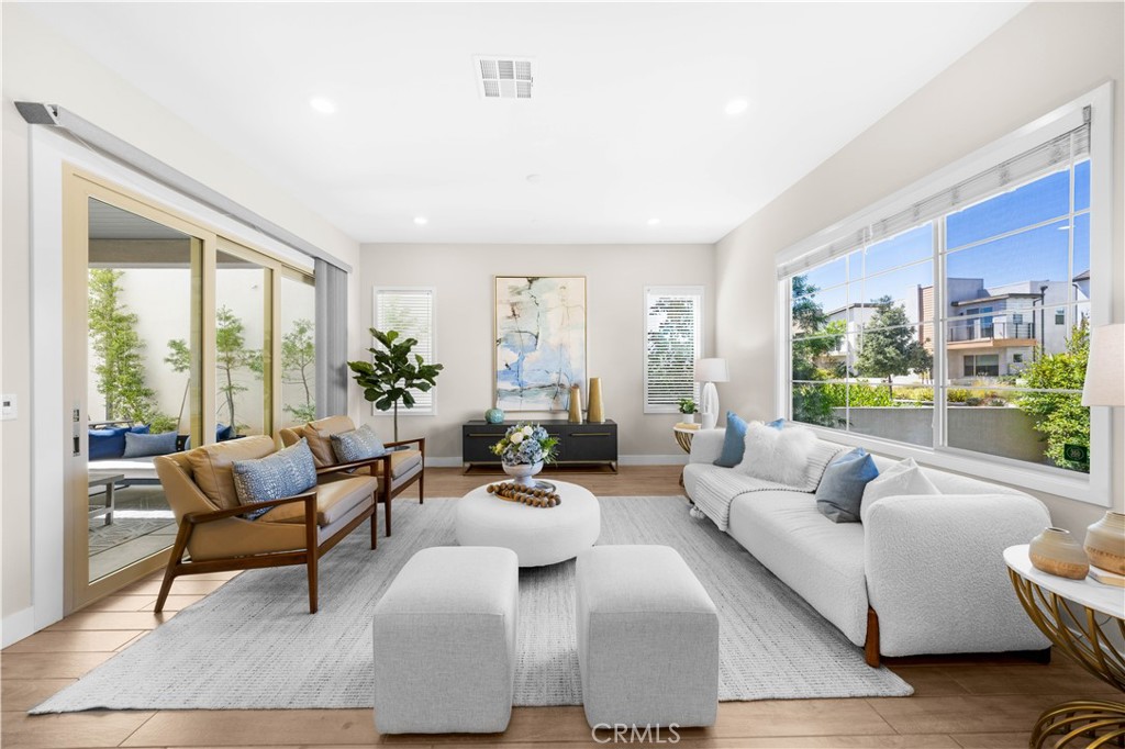 Welcome to 164 Scale, Irvine – a beautifully maintained detached home located in the heart of the Great Park community. Built in 2018, this spacious two-story residence features 4 bedrooms, 4 full bathrooms, and a versatile upstairs loft, with 2,408 square feet of thoughtfully designed living space—perfect for multi-generational living or growing families.
The open-concept main level showcases a modern kitchen with quartz countertops, stainless steel appliances, and a large center island that flows seamlessly into the dining and living areas—ideal for both everyday living and entertaining. A full bedroom and bathroom on the first floor offer flexibility for guests, extended family, or a home office.
Upstairs, the generous primary suite includes a walk-in closet and a spa-inspired bathroom. Two additional bedrooms—each with its own en-suite bath—offer comfort and privacy. The loft area is perfect as a second living space, playroom, or study nook, and the upstairs laundry adds everyday convenience.
Additional highlights include upgraded flooring, recessed lighting, and an attached two-car garage. Enjoy a prime location within walking distance to top-rated Cadence Park School (K–8) and just minutes from world-class community amenities—resort-style pools, parks, playgrounds, and scenic trails.
Don’t miss this opportunity to own a turnkey home in one of Irvine’s most desirable neighborhoods!