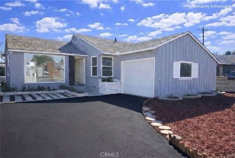 Photo of 9220 Birdvale Dr, Downey, CA 90242 (MLS # IV26017681)