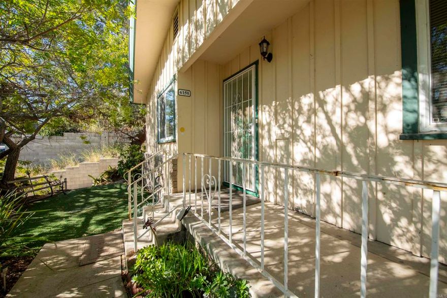 Surrounded by Rolando’s beloved classic architecture, the two-unit property delivers character, space, and exceptional convenience. Located close to SDSU, major shopping, public transit, and freeway access, the setting offers quick connections in every direction.  The property features two 2-bedroom/1-bath units totaling 1,922 sq. ft. The front unit showcases a charming fireplace and striking high wood-beam ceilings, adding warmth and architectural appeal. Both units include large living rooms, spacious eat-in kitchens, full bathrooms, New HVAC systems (2024), upgraded electric panels, fresh interior paint, and brand-new carpet throughout. Each residence also enjoys its own in-unit laundry room—a highly valued amenity.  Parking is abundant with two separate single-car garages (one per unit) plus an additional off-street parking space in front of each garage. A shared patio and yard area offers outdoor space for relaxation or gardening.  A versatile opportunity for investors or owner-occupants seeking income potential in a centrally located and classic San Diego neighborhood.