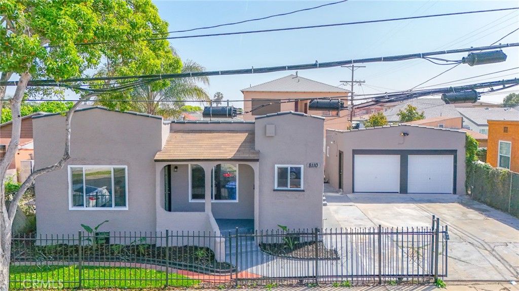 Photo of 8110 S Denker Ave, Los Angeles, CA 90047 (MLS # DW26065424)