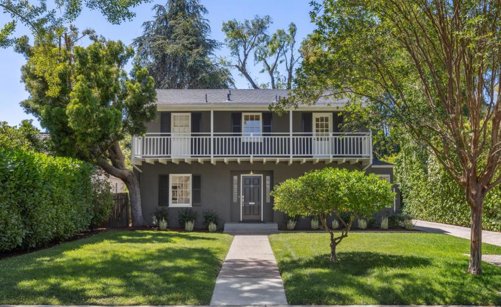 GRACIOUS COMPOUND CREATES UNPRECEDENTED OPPORTUNITY AT THE BEST BLOCK OF COMMUNITY CENTER. Brimming with character and opportunity, this sensational property enjoys the finest qualities of Community Center. Offering a generously sized and rarely available lot, the home is peacefully situated within mere steps of Eleanor Pardee Park. The main residence exudes the graciousness of its Monterey Colonial design with large formal gathering rooms, cascades of natural light, and exterior galleries spanning the front and rear. Upgrades embellish the kitchen and bathrooms, while the primary suite is immense with a sitting area and dual walk-in closets. Perfectly positioned for outdoor enjoyment, the rear garden is south-facing with paver terraces and private vegetable beds. The setting is exquisitely located with easy access to sought-after Palo Alto schools and cultural attractions by Rinconada Park. Replete with an oversized garage and guesthouse (complete with full bath and kitchen), this private compound may be moved into immediately, or reconfigured into your bespoke Palo Alto estate.