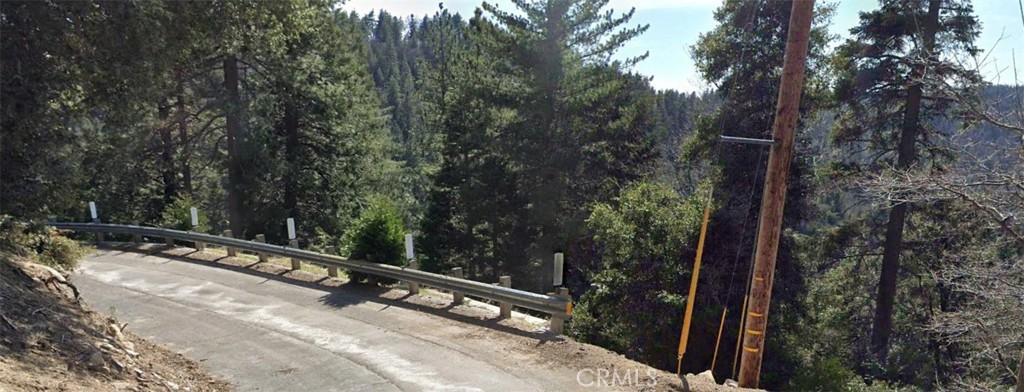 Crestline Arrowhead Highlands area residential lot with water and power in the street. Build your dream cabin in the forest. Close to Lake Gregory, Lake Arrowhead, and Big Bear. APN 0340-181-16-0000. 1170 address used is approximate.